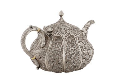 Lot 110 - A late 19th century Anglo – Indian unmarked silver teapot, Kashmir circa 1890