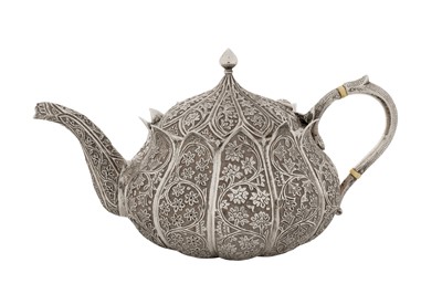 Lot 110 - A late 19th century Anglo – Indian unmarked silver teapot, Kashmir circa 1890