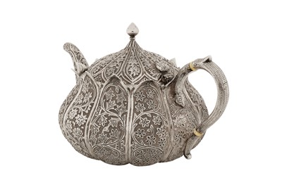 Lot 110 - A late 19th century Anglo – Indian unmarked silver teapot, Kashmir circa 1890