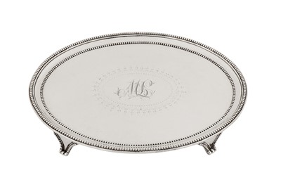 Lot 399 - A George III sterling silver salver, London 1784 by Elizabeth Jones (reg. 15th Jan 1783)