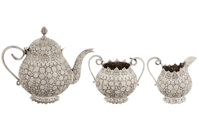 Lot An early 20th century Anglo – Indian silver three-piece tea set, Kashmir with Egyptian import marks for Cairo 1920