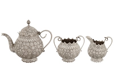 Lot 112 - An early 20th century Anglo – Indian silver three-piece tea set, Kashmir with Egyptian import marks for Cairo 1920