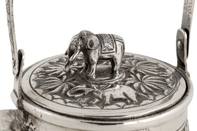 Lot 119 - A late 19th century Anglo – Indian unmarked silver hot water or coffee pot, Lucknow circa 1895