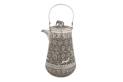 Lot 119 - A late 19th century Anglo – Indian unmarked silver hot water or coffee pot, Lucknow circa 1895