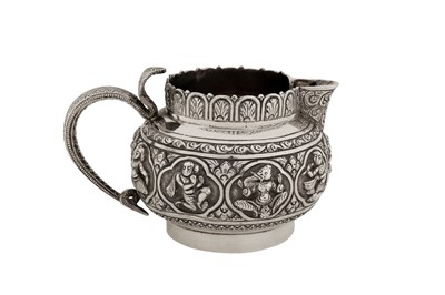 Lot 126 - A late 19th / early 20th century Anglo – Indian unmarked silver cream jug, Madras circa 1900