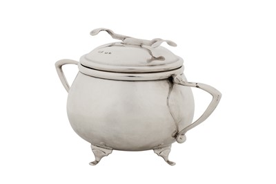 Lot 294 - A George V sterling silver SOS Pascall’s patent covered sugar bowl and tongs, Birmingham 1928 by W Coulthard Ltd