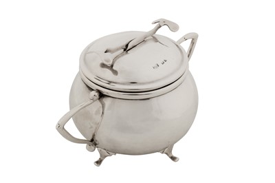 Lot 294 - A George V sterling silver SOS Pascall’s patent covered sugar bowl and tongs, Birmingham 1928 by W Coulthard Ltd
