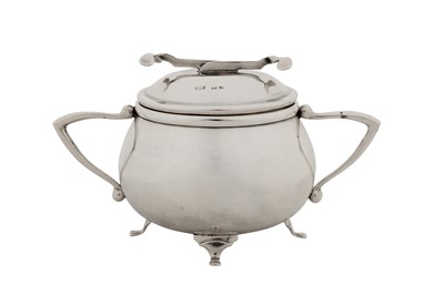 Lot 294 - A George V sterling silver SOS Pascall’s patent covered sugar bowl and tongs, Birmingham 1928 by W Coulthard Ltd