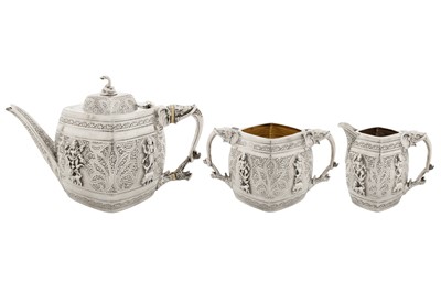 Lot 86 - A Victorian sterling silver Anglo – Indian style three-piece tea service, London 1892 by Edward Hutton