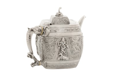 Lot 86 - A Victorian sterling silver Anglo – Indian style three-piece tea service, London 1892 by Edward Hutton