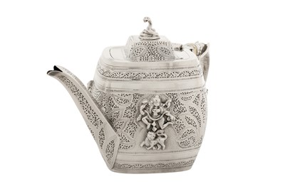 Lot 86 - A Victorian sterling silver Anglo – Indian style three-piece tea service, London 1892 by Edward Hutton