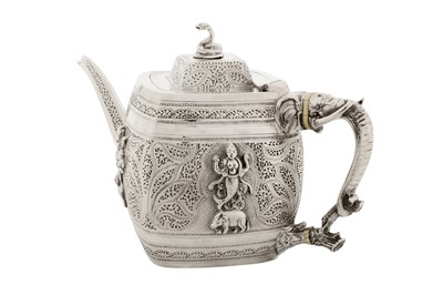 Lot 86 - A Victorian sterling silver Anglo – Indian style three-piece tea service, London 1892 by Edward Hutton