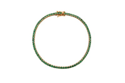 Lot 223 - AN EMERALD LINE BRACELET