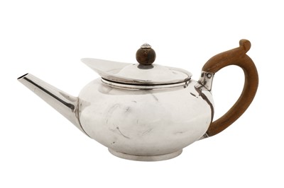 Lot 387 - A George III sterling silver bachelor teapot, London 1819 by Joseph Angell I