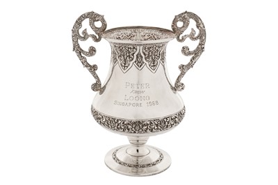Lot 167 - A cased mid-20th century Cambodian unmarked silver twin handled cup, dated 1968