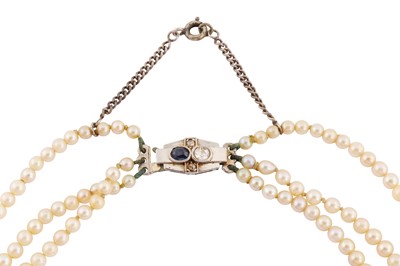 Lot 34 - A THREE-STRAND CULTURED PEARL NECKLACE