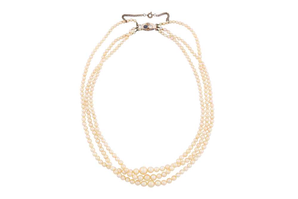 Lot 34 - A THREE-STRAND CULTURED PEARL NECKLACE