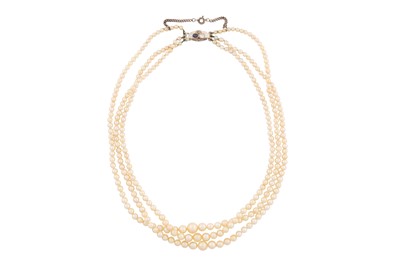 Lot 34 - A THREE-STRAND CULTURED PEARL NECKLACE