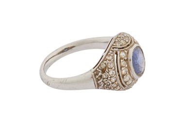 Lot 76 - A SAPPHIRE AND DIAMOND BOMBÉ RING