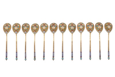 Lot 209 - A set of twelve Nicholas II Russian 84 zolotnik (875 standard) silver gilt and cloisonné enamel teaspoons, Moscow 1898-1908 by Vasily Andreyev