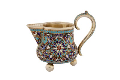 Lot 208 - A Nicholas II Russian 84 zolotnik (875 standard) silver gilt and cloisonné enamel cream jug, Moscow 1896 by C.X (unidentified)