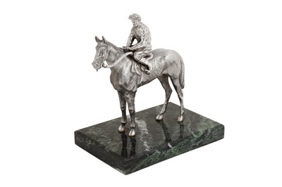 Lot 52 - An Elizabeth II sterling silver model of a jockey on horseback, London 1985 by B S E Products