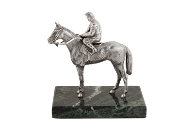 Lot 52 - An Elizabeth II sterling silver model of a jockey on horseback, London 1985 by B S E Products