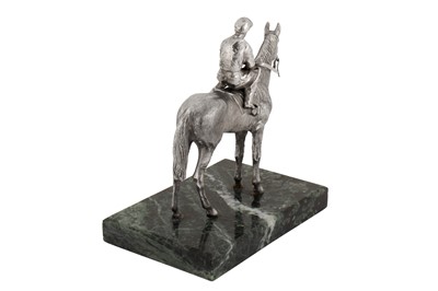 Lot 52 - An Elizabeth II sterling silver model of a jockey on horseback, London 1985 by B S E Products