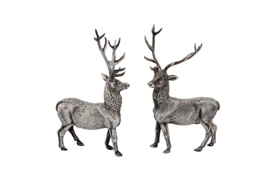 Lot 50 - A pair of Elizabeth II sterling silver models of stags, London 1995 by Edward Barnard