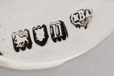 Lot 19 - A cased pair of Edwardian sterling silver and guilloche enamel place card or menu holders, London 1908 by J Batson and Son