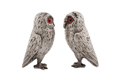 Lot 41 - A cased pair of Victorian sterling silver novelty pepper pots, London 1867 by Richards and Brown