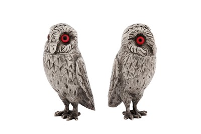 Lot 41 - A cased pair of Victorian sterling silver novelty pepper pots, London 1867 by Richards and Brown