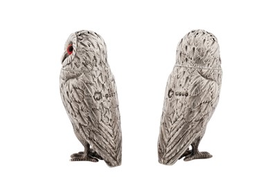Lot 41 - A cased pair of Victorian sterling silver novelty pepper pots, London 1867 by Richards and Brown