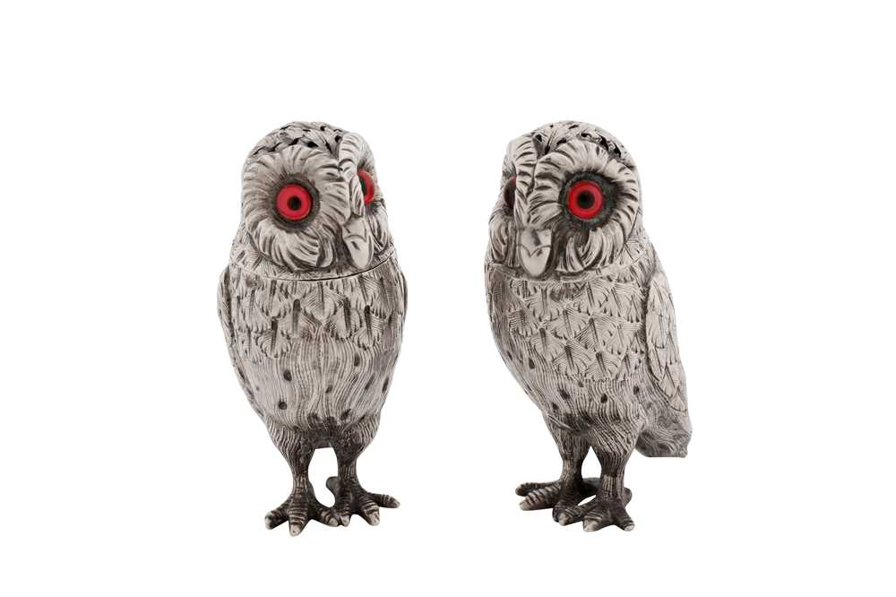 Lot 41 - A cased pair of Victorian sterling silver novelty pepper pots, London 1867 by Richards and Brown