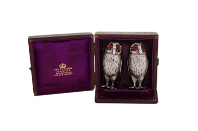 Lot 41 - A cased pair of Victorian sterling silver novelty pepper pots, London 1867 by Richards and Brown