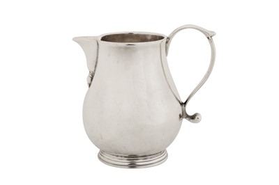 Lot 414 - A George I sterling silver ‘sparrow beak’ cream jug, London 1726 probably by John Eckfourd II (reg. 23rd June 1725)