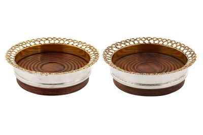 Lot 269 - A pair of Elizabeth II modernist parcel gilt sterling silver wine coasters, London 1976 by Stuart Devlin (1931-2018)