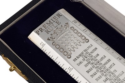 Lot 74 - A cased Elizabeth II sterling silver commemorative ruler, London 2003 by Richard Jarvis