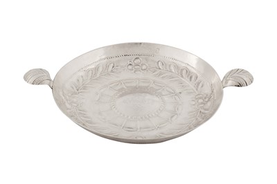 Lot 426 - A Commonwealth sterling silver sweatmeat dish or saucer, London 1656 by William Harrison (free. 1646, d. 1701)