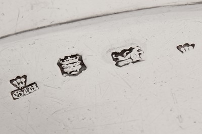 Lot 572 - Lamb service - A large pair of George II sterling silver second course dishes, London circa 1750 by George Wickes (this mark reg. 6th July 1739)