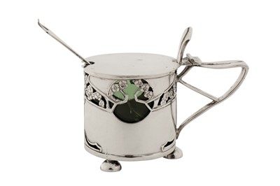 Lot 256 - An Edwardian Art Nouveau sterling silver mustard pot, London 1901 by W. G. Connell, designed by Kate Harris (1878-1949)