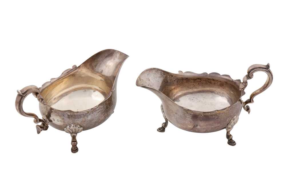 Lot 206 - A pair of George V sterling silver sauceboats, London 1927 by Goldsmiths and Silversmiths