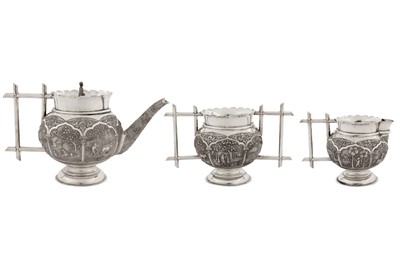 Lot 114 - An unusual and large early 20th century Anglo – Indian unmarked silver three-piece tea service, Calcutta circa 1910