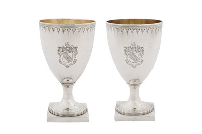 Lot 395 - A pair of George III sterling silver goblets, London 1792 by John Robins