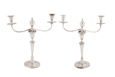 Lot 385 - A pair of George III Old Sheffield Silver Plate candelabra, Sheffield circa 1780 by Matthew Boulton