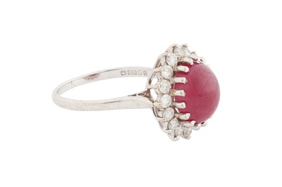 Lot 99 - A RUBY AND DIAMOND CLUSTER RING