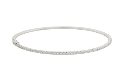 Lot 283 - A DIAMOND BANGLE