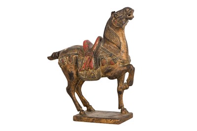 Lot 103 - A CHINESE TANG-STYLE WOOD FIGURE OF A HORSE