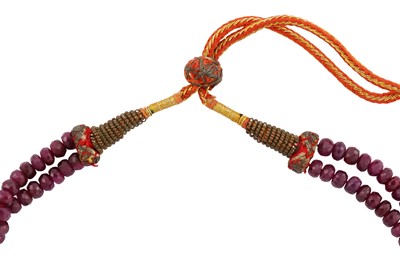 Lot 87 - A TWO-STRAND RUBY BEAD NECKLACE