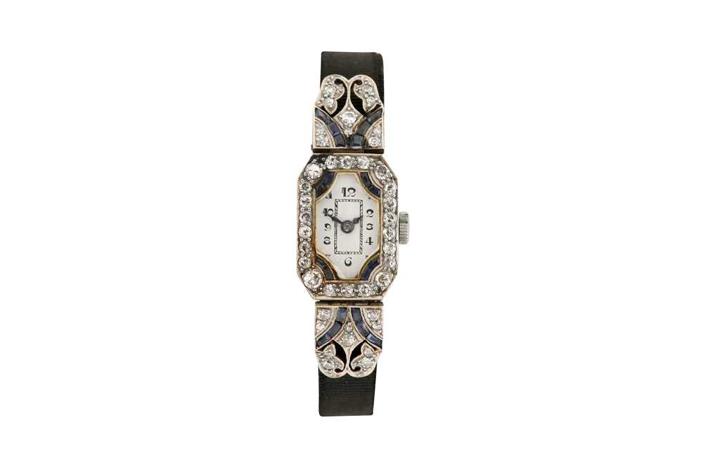 Lot 495 - ART DECO SAPPHIRE AND DIAMOND COCKTAIL WATCH - PLATINUM